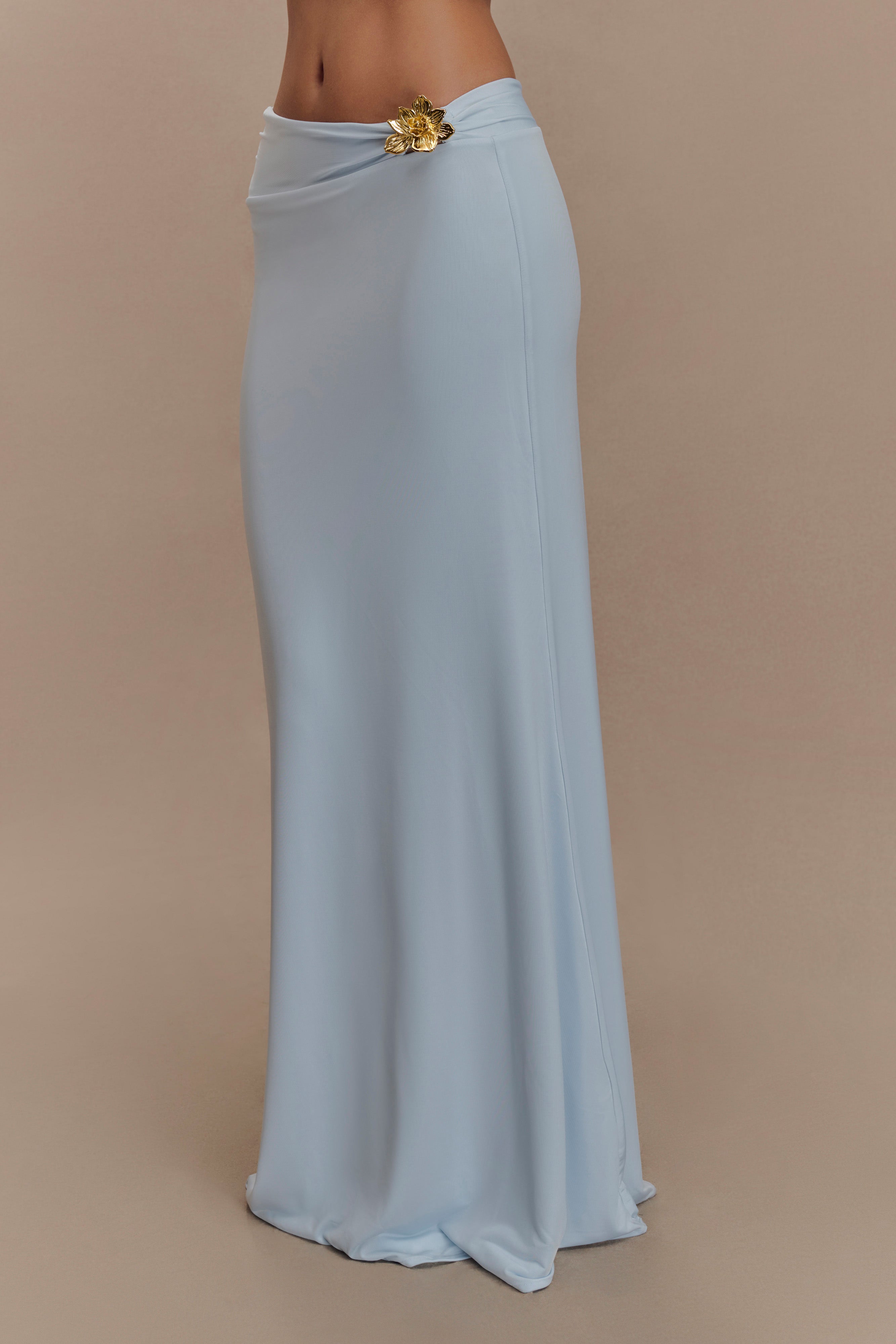 Ainsley Asymmetrical Maxi Skirt With Floral Hardware in Pale Blue – Chic&Drifts